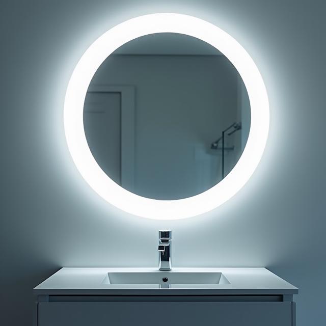 A large, round backlit LED mirror above a vanity.